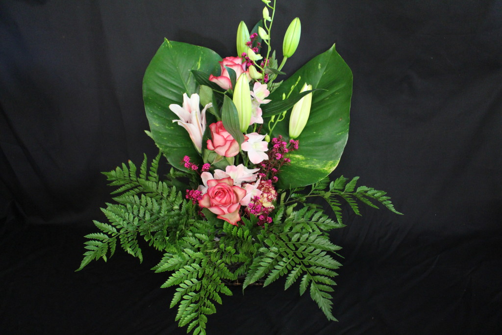 Box 5: Oriental Lilly With Singapore Orchid & Variegated Roses,
$90.00